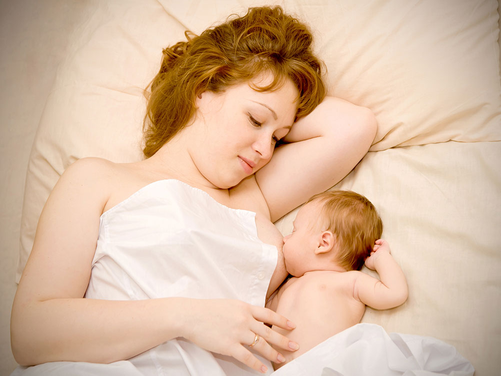 mother breastfeeding baby