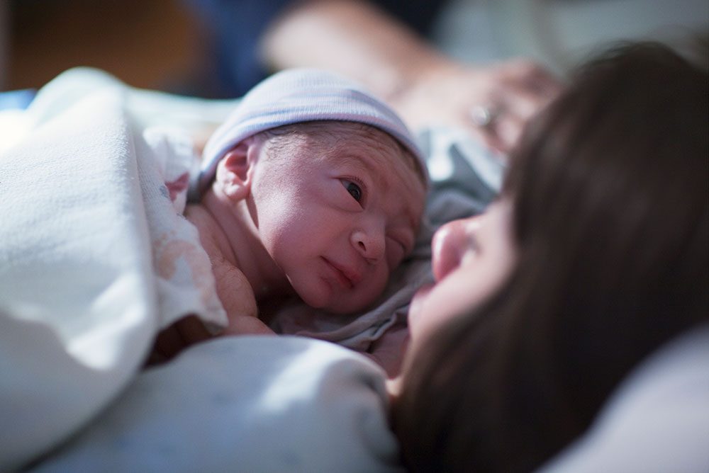 Mother with newborn baby